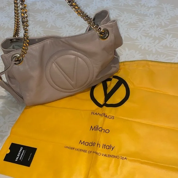 Beautiful Valentino Bag come with dust bag